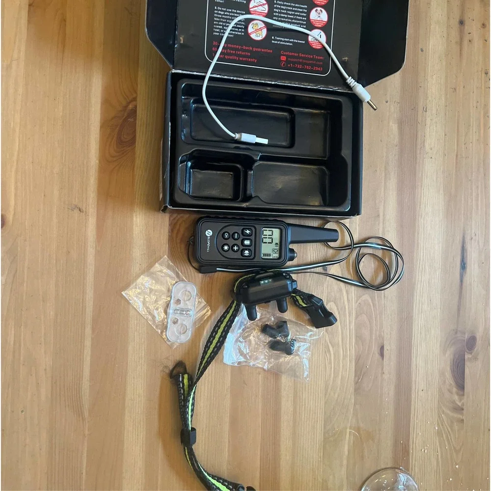 Dog obedience collar shock vibration sound shock turn off button.